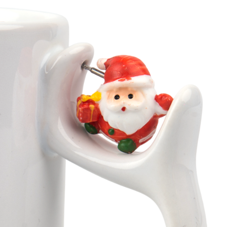 White mug with Santa Claus in handle